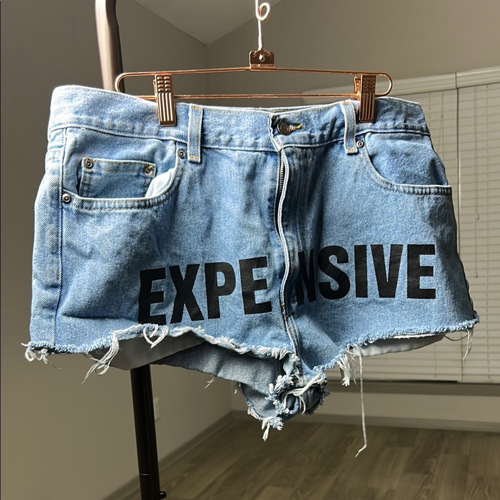 High-waisted Distressed Graphic Shorts